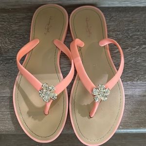Ladies size 11 Panama Jack coral pink flip flop w/ rhinestone floral attachement
